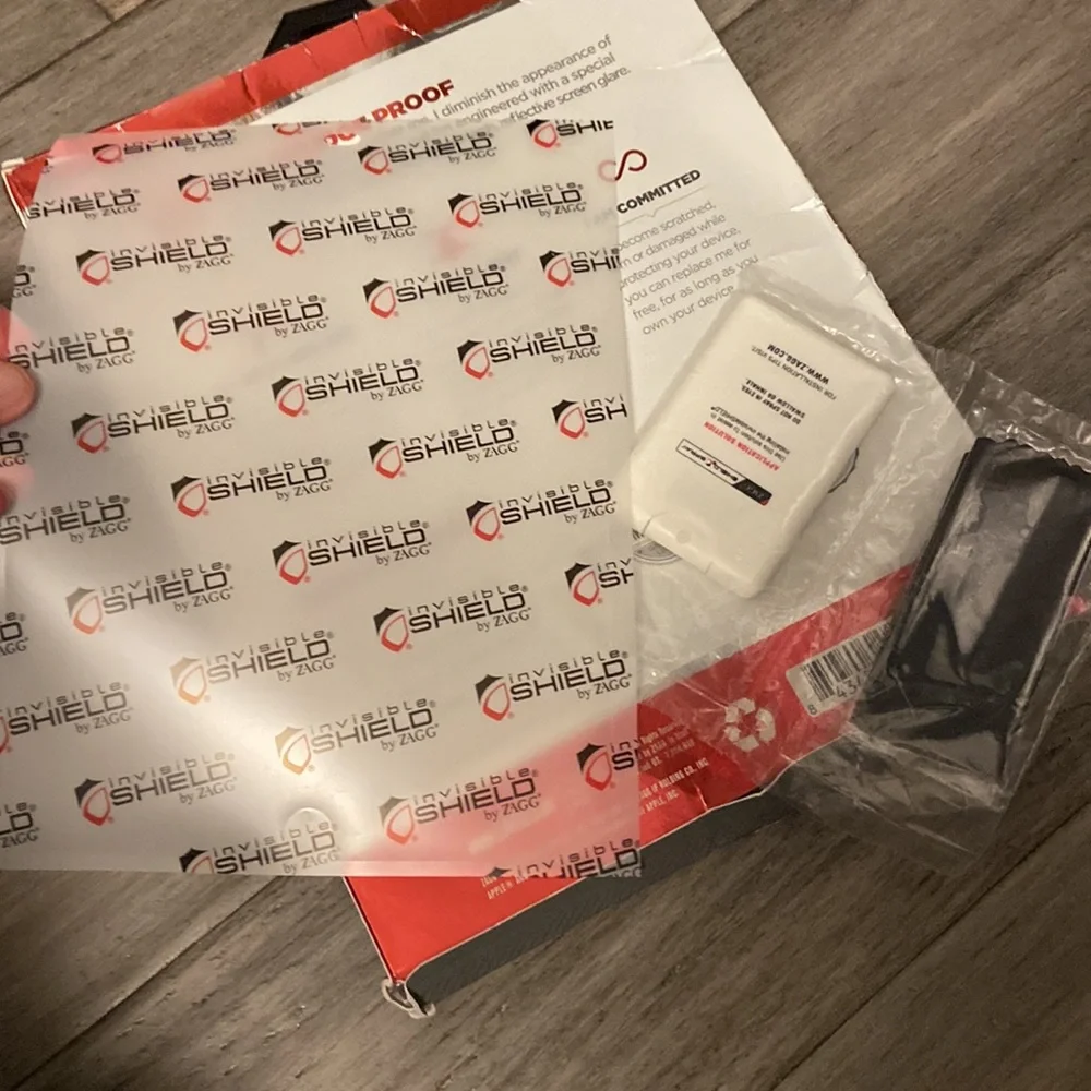 Zagg invisible shield smudge proof screen-cut to size for multiple phone uses